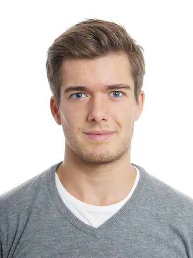 Original studio portrait of a young man on a white background, JPG